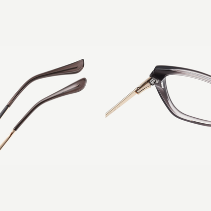 Close-up of a pair of eyeglasses with a white background