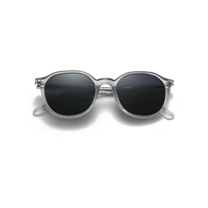 Round sunglasses with dark lenses and clear frame on a white background