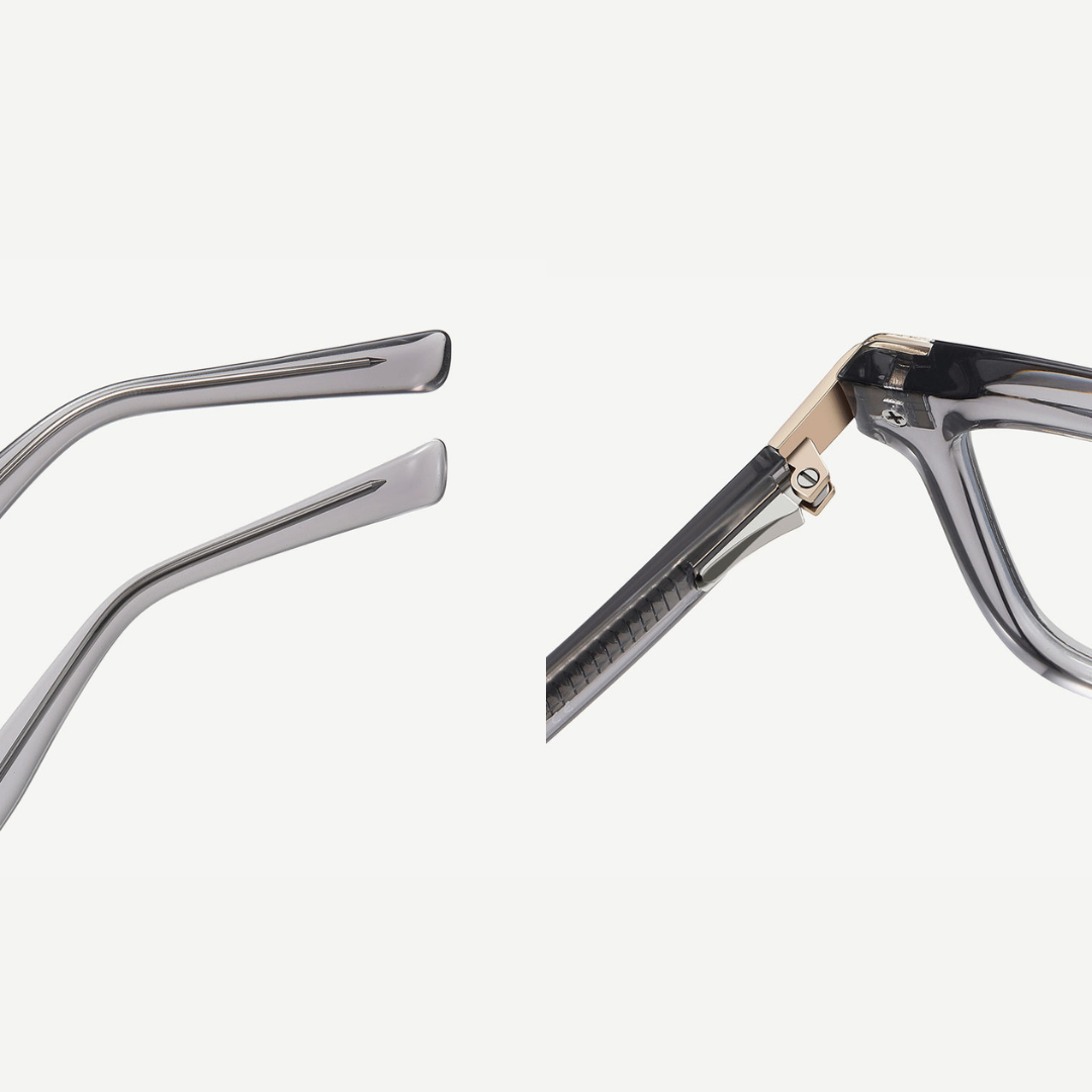 Close-up of a broken eyeglass frame on a white background