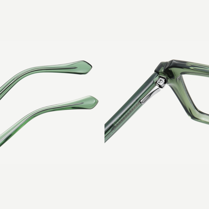 Close-up of green eyeglass frames on a white background